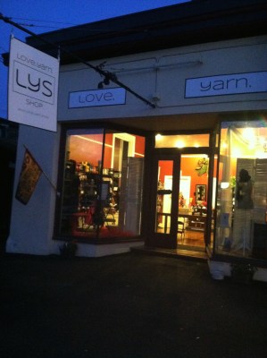 The warm glow of a yarn shop on Bethlehem's Main Street.